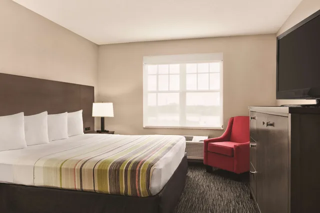 جناح بريميوم بسرير كينج بغرفة نوم واحدة بمطبخ، Country Inn and Suites by Radisson Tampa/Brandon FL 1/5
