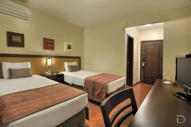 غرفة سوبيريور بسريرين منفصلين، Hotel Deville Business Maringa 4/4