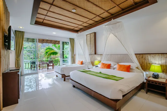 كوخ بريميير ثلاثي بسرير مزدوج وسرير فردي، Ban Sainai Resort - SHA Extra Plus 6/10