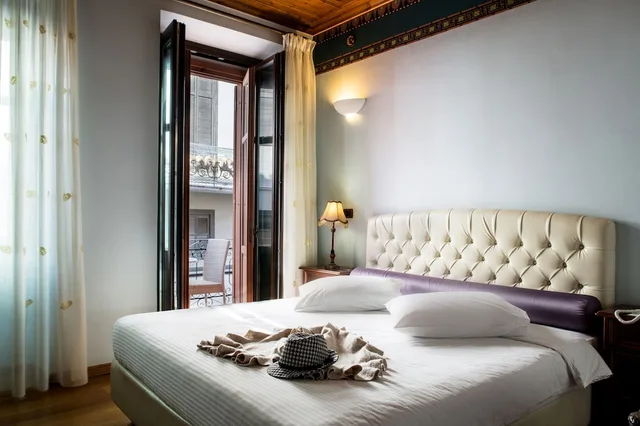 غرفة بسرير كينج، Kyveli Suites 1/7
