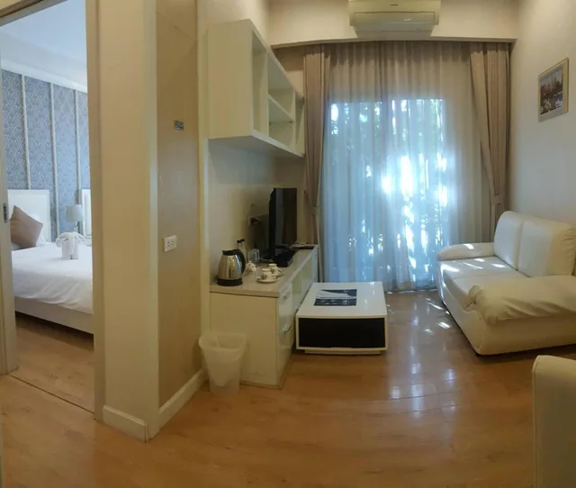 غرفة بسريرين منفصلين بحوض استحمام، Harmony Resort Hotel 4/10