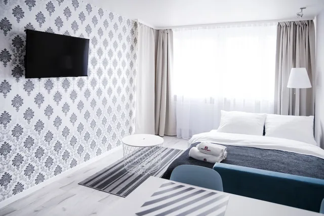 شقة كومفورت بسرير كوين بشرفة بغرفة نوم واحدة مع أريكة، Hosapartments City Center 2/3