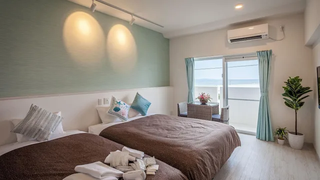 غرفة قياسية بسريرين منفصلين، Kariyushi Condominium Resort Yonabaru SUNRIZE OCEAN 2/2