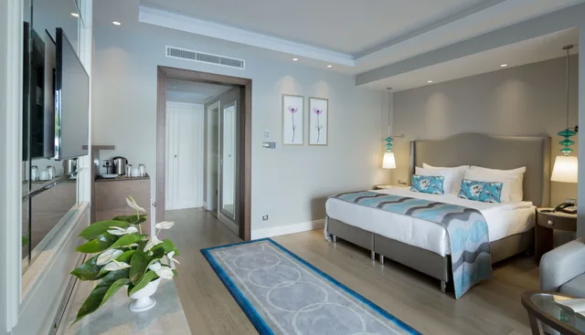 Swim Up, Pool, Family, Suite, Queen and Twin Beds, 2 Sofa، Titanic Deluxe Golf Belek 7/10
