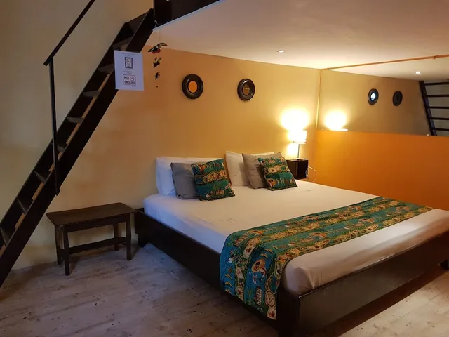 غرفة رباعية بسرير كينج وسريرين منفصلين بإطلالة على الحديقة، Hotel La Palapa 2/7