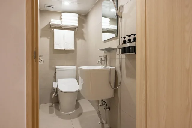 غرفة قياسية رباعية بسريرين مزدوجين، Myeongdong Guesthouse Como 6/6