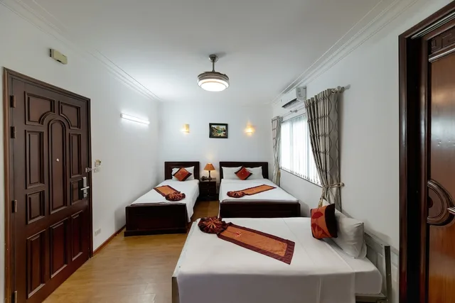 غرفة ديلوكس عائلية بسرير كوين وسرير فردي، Phoenix Legend Hotel 8/10