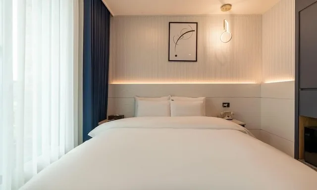 غرفة بسرير كوين بشرفة، Jecheon Hound Hotel 1/4