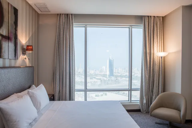 غرفة ديلوكس بسرير كينج، Grand Majestic Hotel Kuwait 1/7