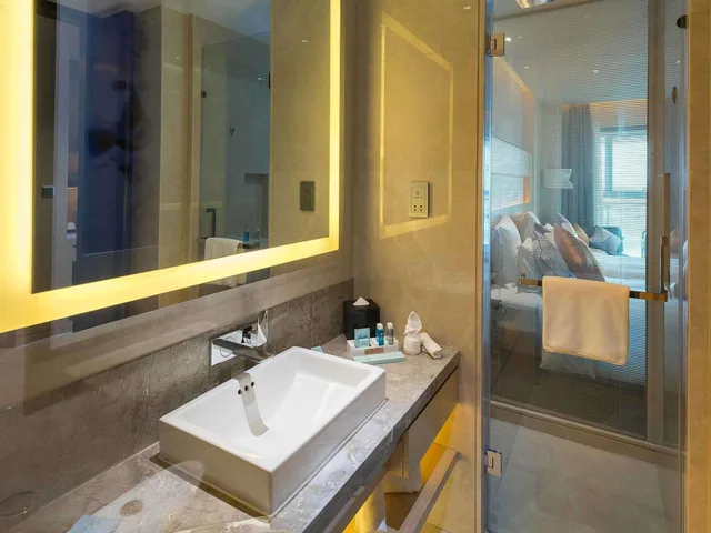 غرفة ديلوكس بسرير كينج بإطلالة على البحيرة، Novotel Suzhou Sip 9/10
