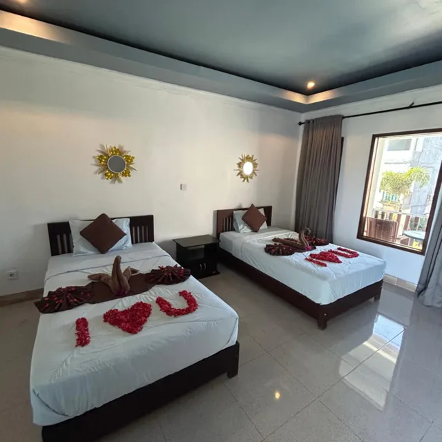 غرفة قياسية بسريرين منفصلين بإطلالة على الحديقة، Ridho Malik Hotel 1/7
