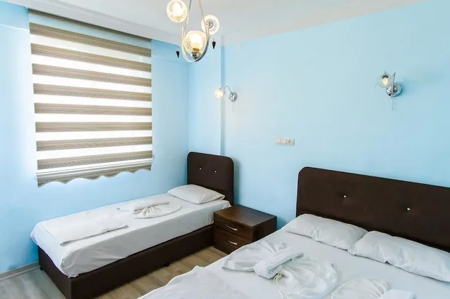 غرفة ثلاثية بسرير مزدوج وسرير فردي، Misa Pansiyon Apart 1/3