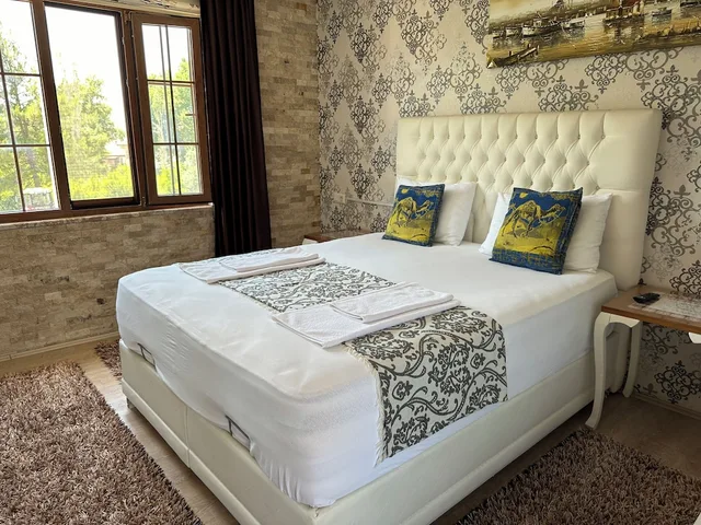 غرفة ديلوكس رباعية بسرير كينج وسرير بطابقين، Sinter Terasse House Hotel 1/6