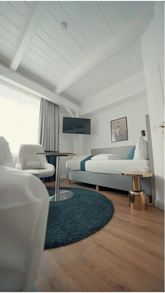 غرفة كلاسيكية ثلاثية بسرير كينج وسرير فردي، Hotel Barbarossa Classic 4/9