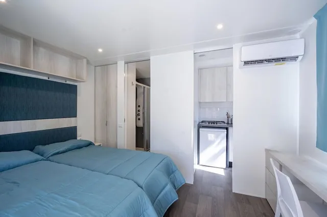 غرفة بريميوم ثلاثية بثلاثة أسرّة، Camping Village Torre Pendente 3/9
