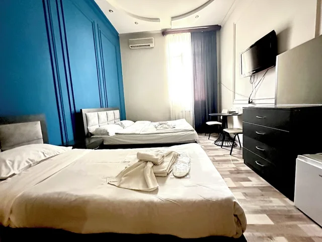 غرفة عائلية رباعية بسرير كوين وسريرين منفصلين، Bella Hotel 6/10