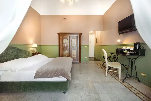 غرفة ديلوكس بسرير كوين، Antica Badia Relais 4/10