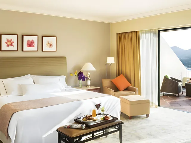 غرفة غراند بسرير مزدوج أو سريرين منفصلين بإطلالة على الشاطئ، Grand Coloane Resort 1/1