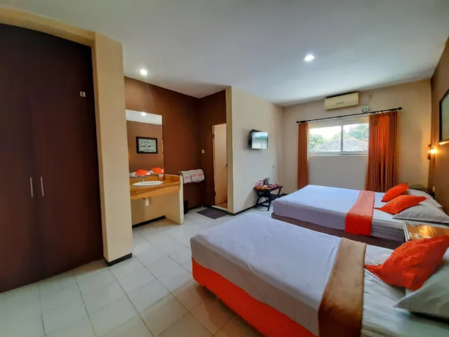 غرفة عائلية بسرير فردي، Helios Hotel Malang 1/1