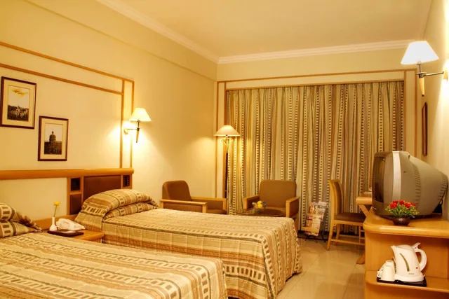 غرفة تنفيذية بسريرين منفصلين، Aditya Park A Sarovar Portico Hotel 1/2