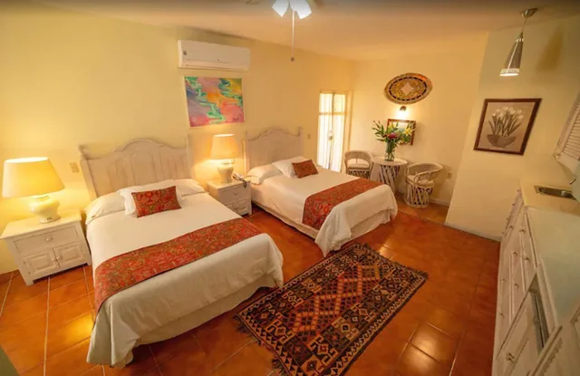 غرفة بسريرين مزدوجين، Villa Mirasol Hotel 1/3