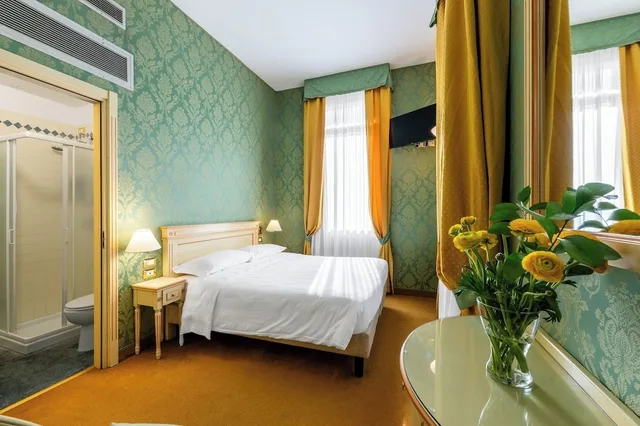 غرفة كلاسيكية ثلاثية بسرير كوين مع أريكة، Hotel Villa Delle Palme 7/10