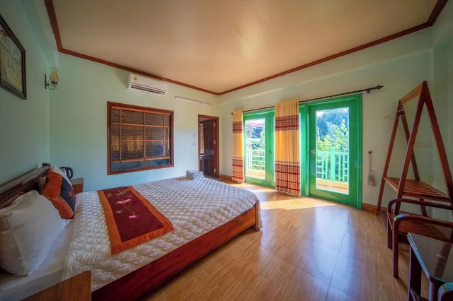 غرفة عائلية بسرير كوين وسرير فردي بشرفة، Tam Coc Tuan Minh Homestay 7/10