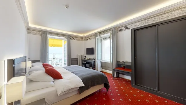 غرفة سوبيريور ديلوكس بسريرين منفصلين بإطلالة على البحيرة بشرفة، GOLF HOTEL RENE CAPT 4/5