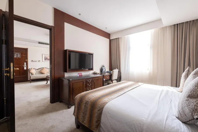جناح جونيور بسرير كينج، Tang Palace Hotel 1/4