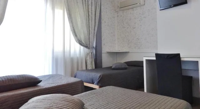 غرفة ثلاثية بسرير مزدوج وسرير فردي، Hotel Marte 5/5