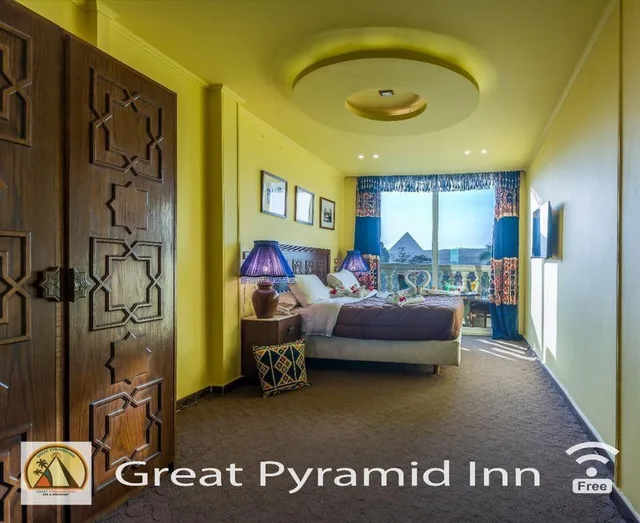 Deluxe, Quadruple, 2 Queen Beds, Pyramids View, Balcony، Great Pyramid Inn 2/3