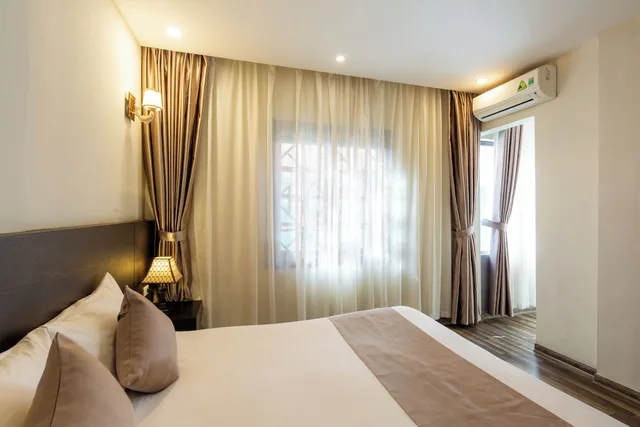 جناح عائلي بسرير كينج وسرير كوين بغرفتي نوم مع أريكة، Lacasa Sapa Hotel (Ex. Hoang Ha Sapa Hotel) 8/10