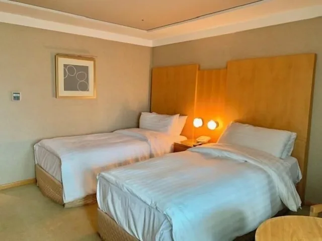 غرفة ديلوكس بسريرين منفصلين، The Grand Hotel Daegu 1/10