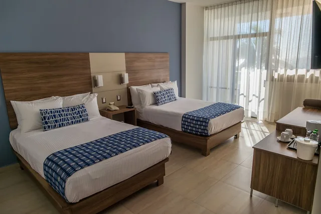 غرفة قياسية بسريرين مزدوجين بإطلالة على المدينة، Ocean View Beach Hotel 3/4