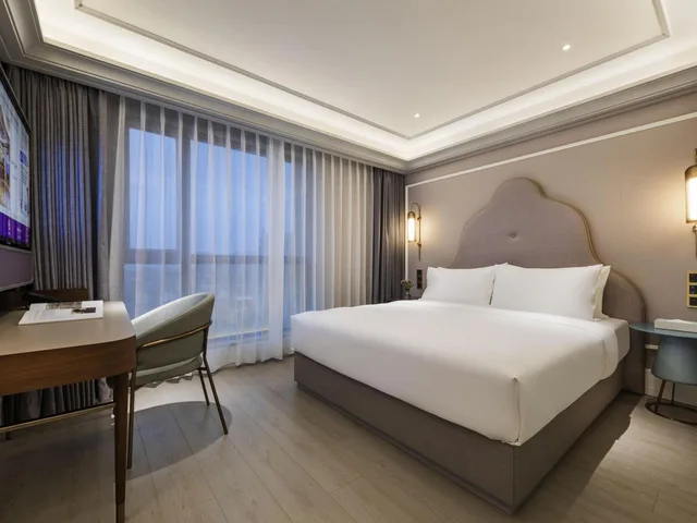 غرفة بريفيليج بسرير كينج وسرير كوين، Mercure Nantong Downtown 1/4
