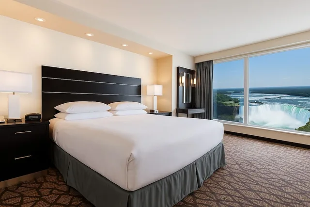Room, King Bed, Partial Falls View, Sofa, Jetted Tub, Embassy Suites By Hilton Niagara Falls Fallsview 1/10