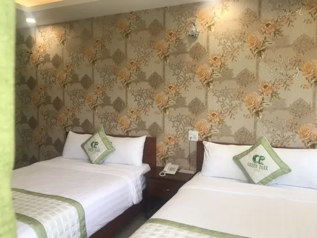 غرفة ديلوكس رباعية بسريرين مزدوجين بإطلالة على المتنزه، Green Park Hotel Quy Nhon 3/7