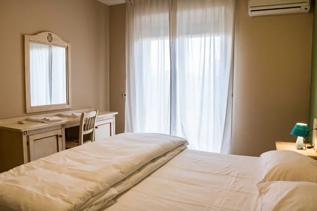 شقة كومفورت بسرير كوين وسريرين منفصلين بغرفتي نوم مع أريكة، Le Residenze Di Santa Costanza 5/10