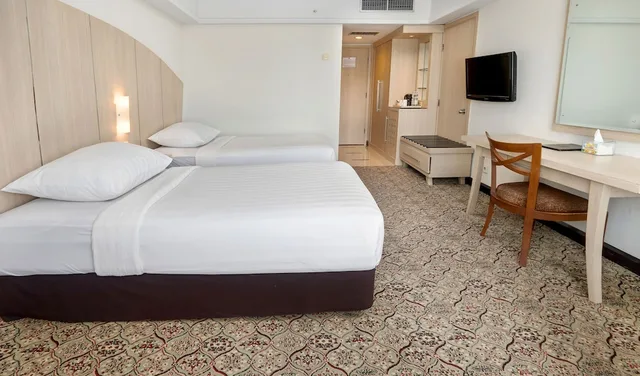 غرفة ديلوكس بسريرين منفصلين بغرفتي نوم، Hotel Pangeran Pekanbaru 1/7