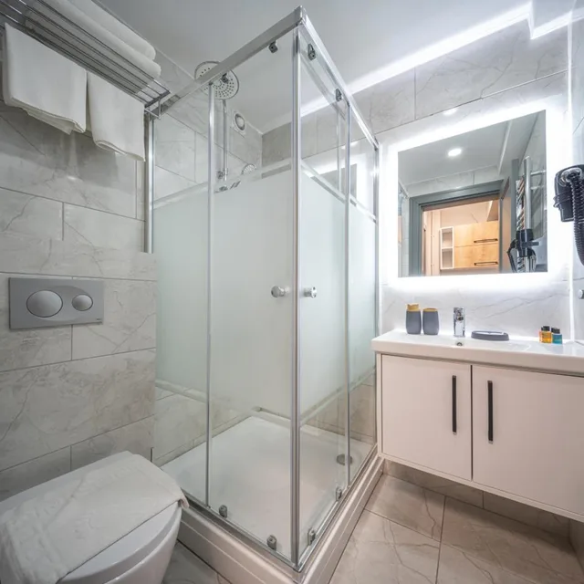 غرفة ديلوكس بسرير مزدوج أو سريرين منفصلين بإطلالة على الحديقة، Calanthe Residence 9/10
