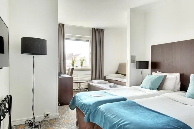 غرفة كلاسيكية بسرير كوين مع أريكة، Profilhotels Garden 2/6