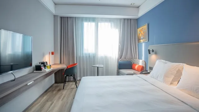 غرفة قياسية بسرير كينج لذوي الإعاقة، HOLIDAY INN EXPRESS NANTONG XINGHU 1/3