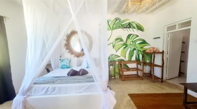 غرفة ديلوكس بسرير مزدوج مع سرير إضافي، Garden Beach Bungalows 5/10