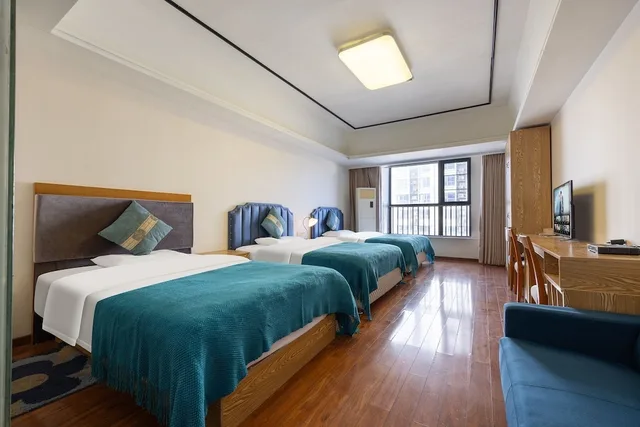 غرفة بزنس ثلاثية بسريرين مزدوجين، Home Inn Huayi Apartment 6/10
