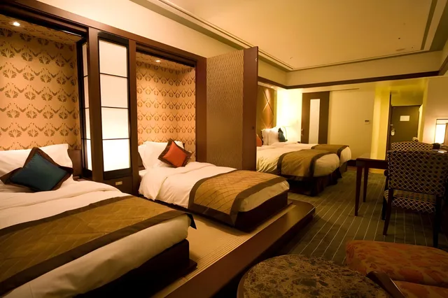 غرفة بريميير بأربعة أسرّة، Okinawa Kariyushi Resort Exes Onna (ex. Okinawa Spa Resort Exes) 1/2