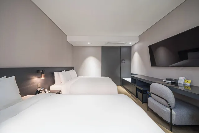 غرفة بريميوم بسريرين منفصلين وسرير كوين، Rivertain Hotel Gyeongju 2/5