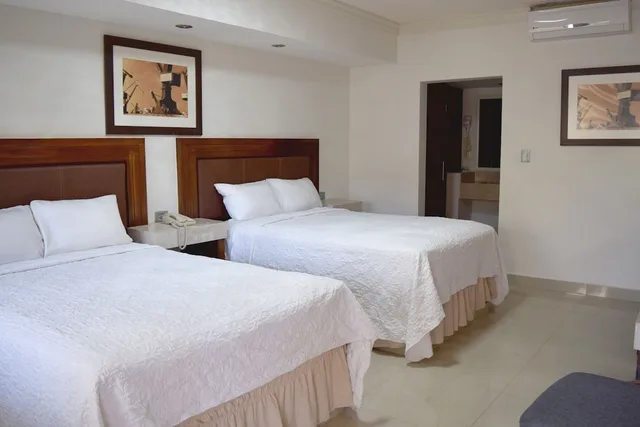 غرفة قياسية بسريرين كوين، Hotel San Ignacio Inn 1/6