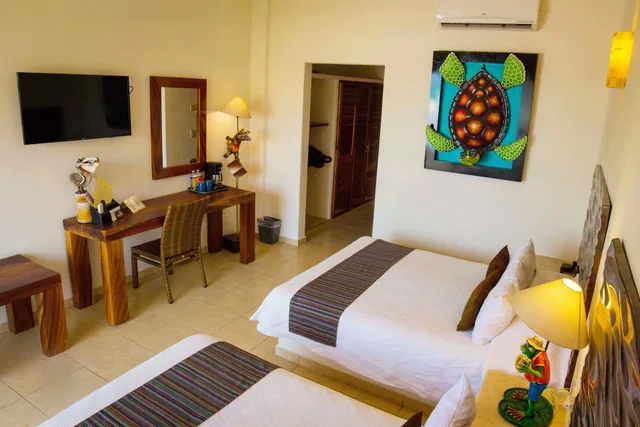 غرفة قياسية بسرير مزدوج بإطلالة على البحر، Quinta Bella Huatulco 2/2