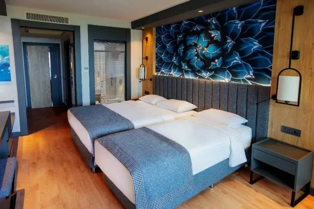 غرفة اقتصادية عائلية بسريرين منفصلين بغرفة نوم واحدة، Alarcha Hotels and Resort 1/4