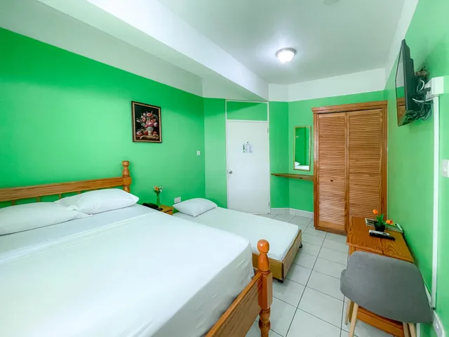 غرفة قياسية بسرير مزدوج وسرير فردي، La Flamboyant Hotel 5/10
